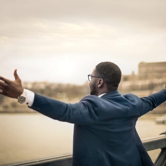 Man looking out into a bay, finding purpose