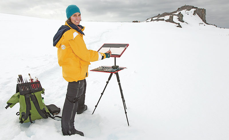 woman painting landscape, icebergs